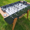 Joueurs en aluminium chromé et noir vissés sur barres inox télescopiques pour un jeu fluide et durable.